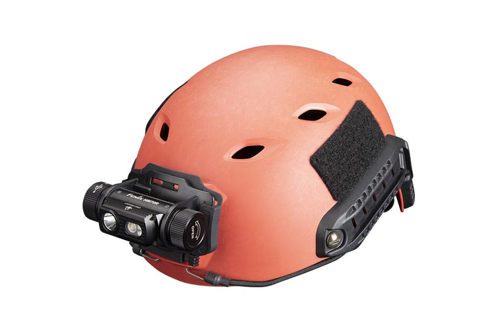 Fenix ALG-04 Helmet Clip on a helmet with a headlamp attached