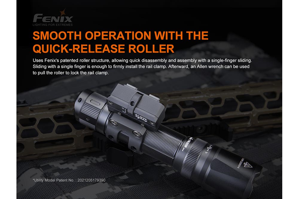 Fenix ALG-16 M-Lok Rail Mount attached to a flashlight sitting on camo surface
