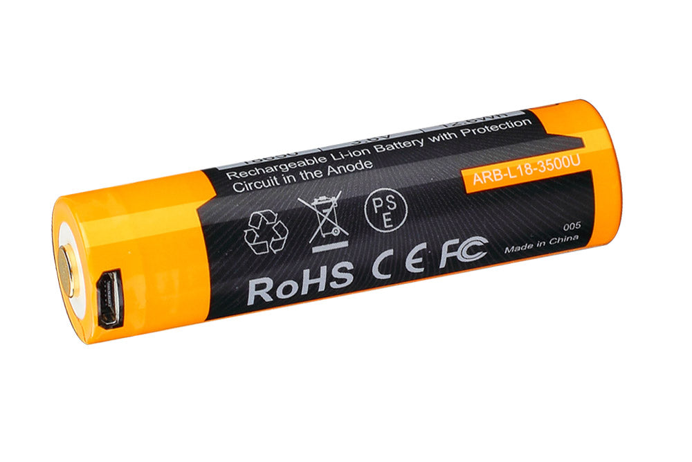 A Fenix ARB-L18-3500U rechargeable lithium-ion battery with built-in USB port, predominantly black with orange accents, labeled with RoHS and CE certification marks.