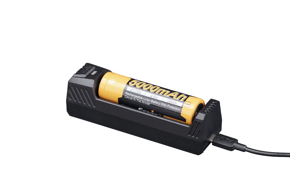 A black Fenix ARE-X1 V2.0 smart battery charger with a yellow battery inserted, and a USB Type-c cable attached.