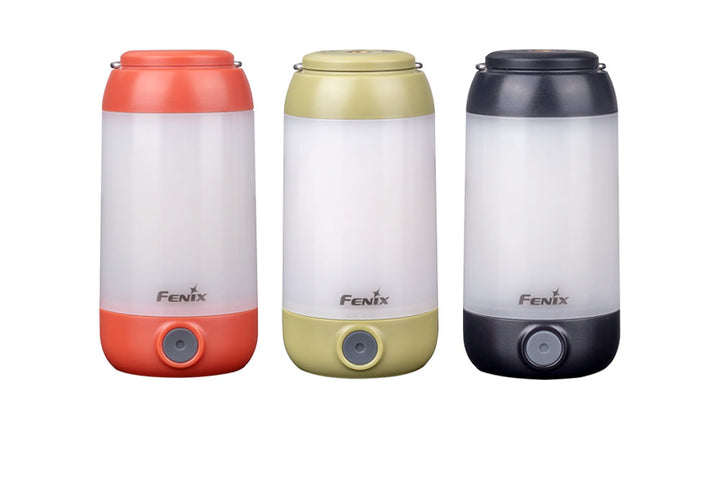 Three Fenix CL26R camping lanterns in different colors (red, green, and black) standing vertically.