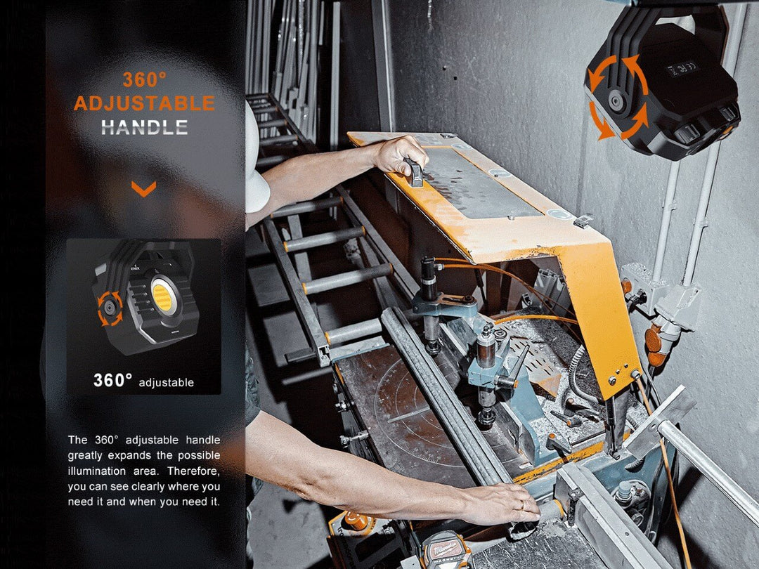 Fenix CL28R multifunctional outdoor lantern hanging by its rotating handle, shining light onto a table saw