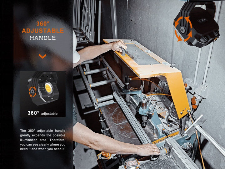 Fenix CL28R multifunctional outdoor lantern hanging by its rotating handle, shining light onto a table saw