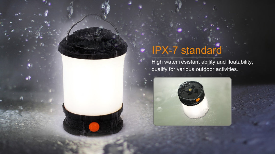 Fenix CL30R LED camping lantern in the rain on a wet surface
