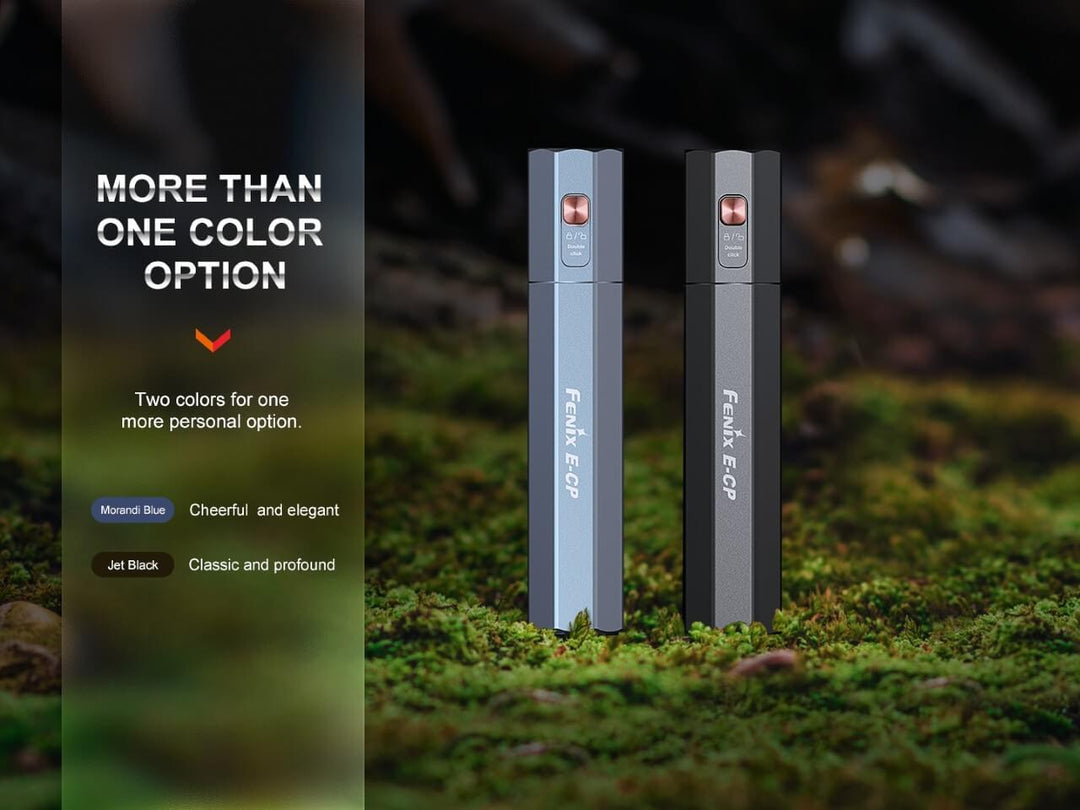 Fenix E-CP Powerbank Flashlight in black and blue sitting on a mossy surface