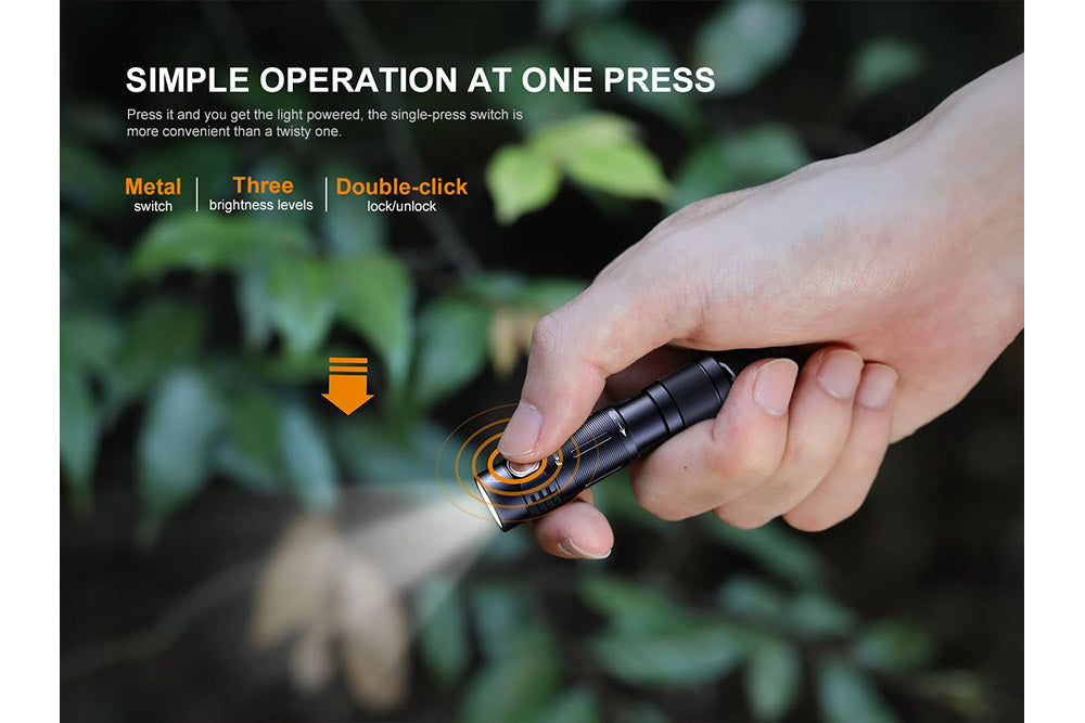 Fenix E05R Mini Keychain LED Flashlight held in hand 