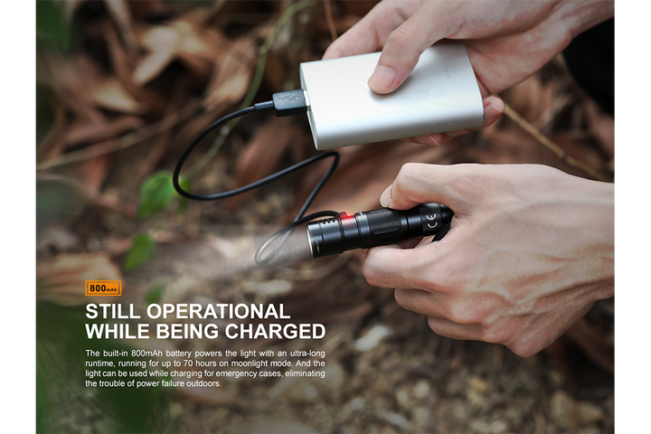 Fenix E09R rechargeable flashlight used while being charged
