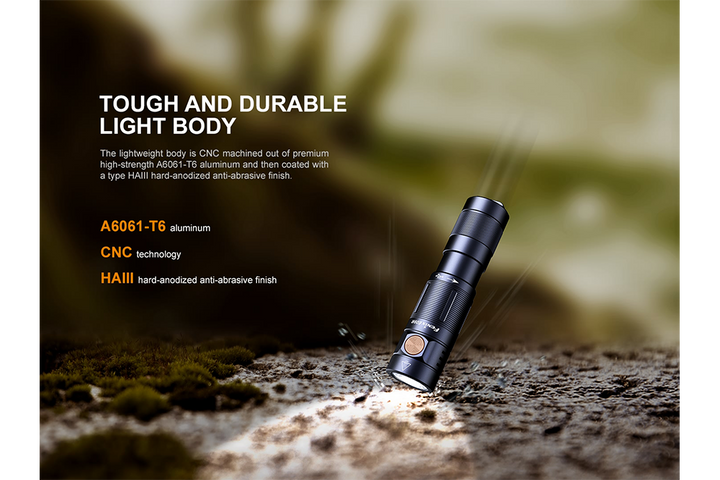 Fenix E09R rechargeable flashlight dropped on stone
