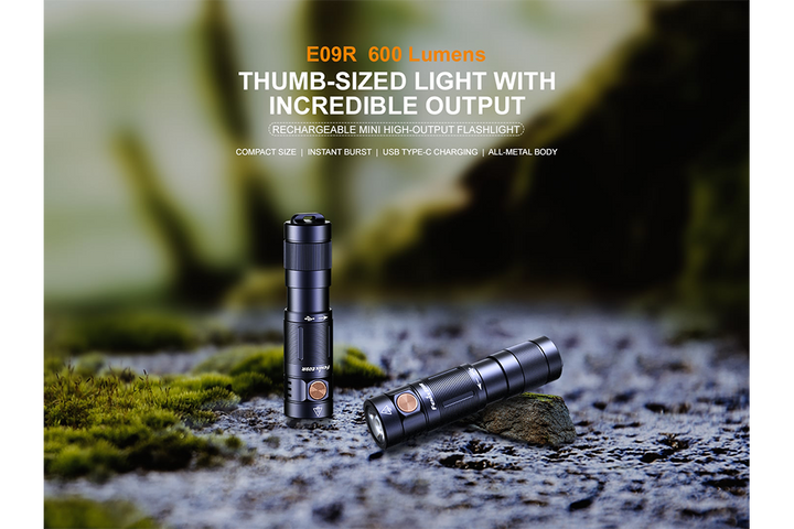 Fenix E09R rechargeable flashlight on stone