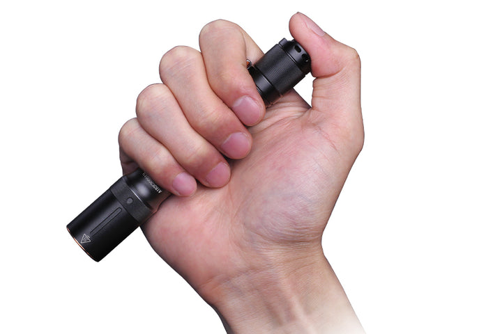 Fenix E20 V2 EDC Flashlight held in hand