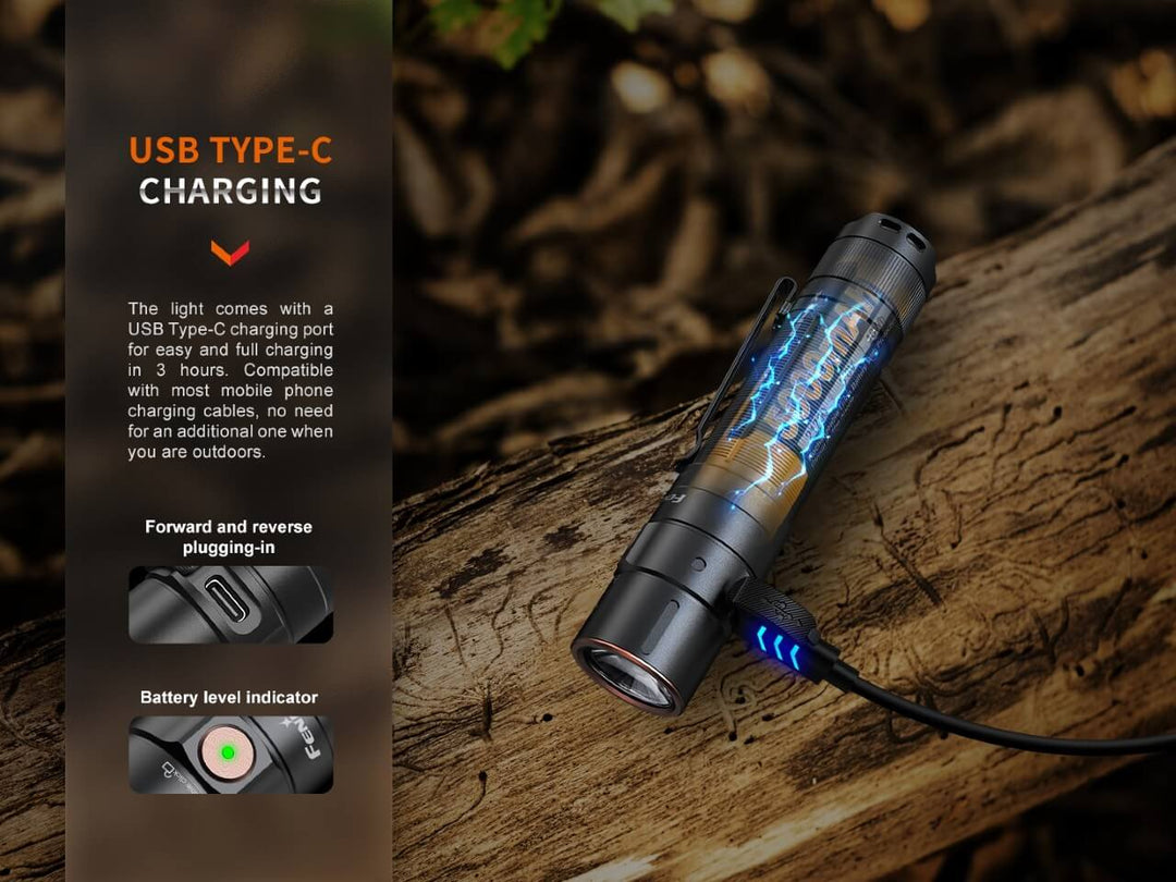 Fenix E35R high-performance rechargeable LED flashlight charging while sitting on a log