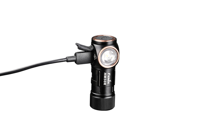 Fenix HM50R V2 LED headlamp plugged in to charge
