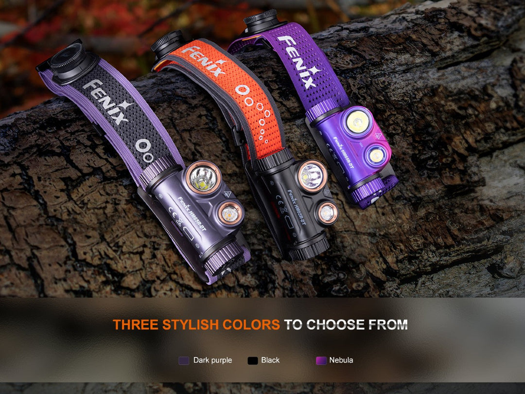 Fenix HM65R-DT trail running headlamp in three colors hanging on a branch