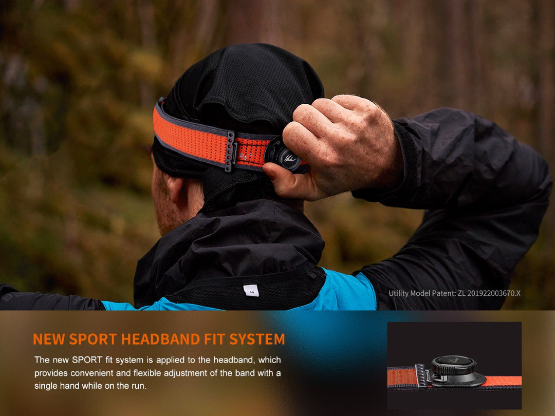 A hiker using the SPORT tightening system of the Fenix HM65R-DT trail running headlamp 