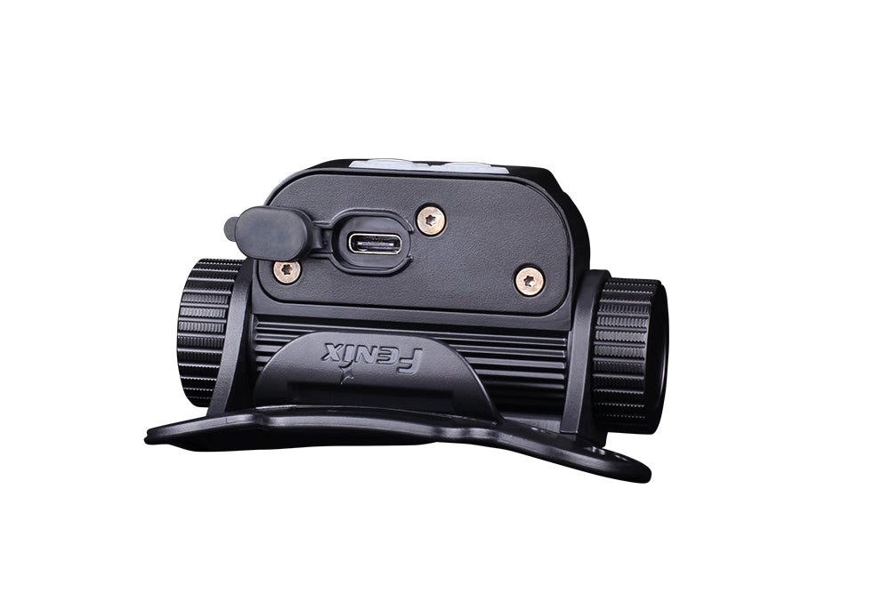 The back of the Fenix HM65R rechargeable LED headlamp with the USB-C charging port open