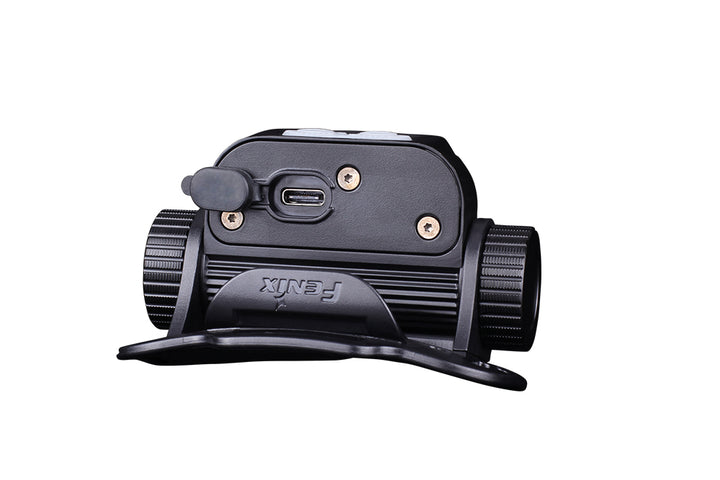 The back of the Fenix HM65R rechargeable LED headlamp with the USB-C charging port open