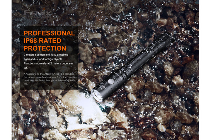 Fenix LD22 V2 compact LED flashlight in a river