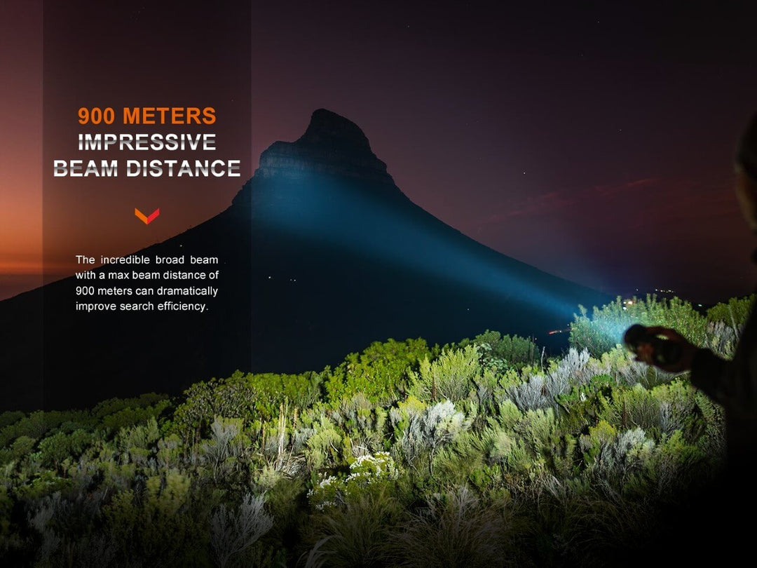 Fenix LR40R V2 rechargeable LED searchlight lighting up a far away mountain