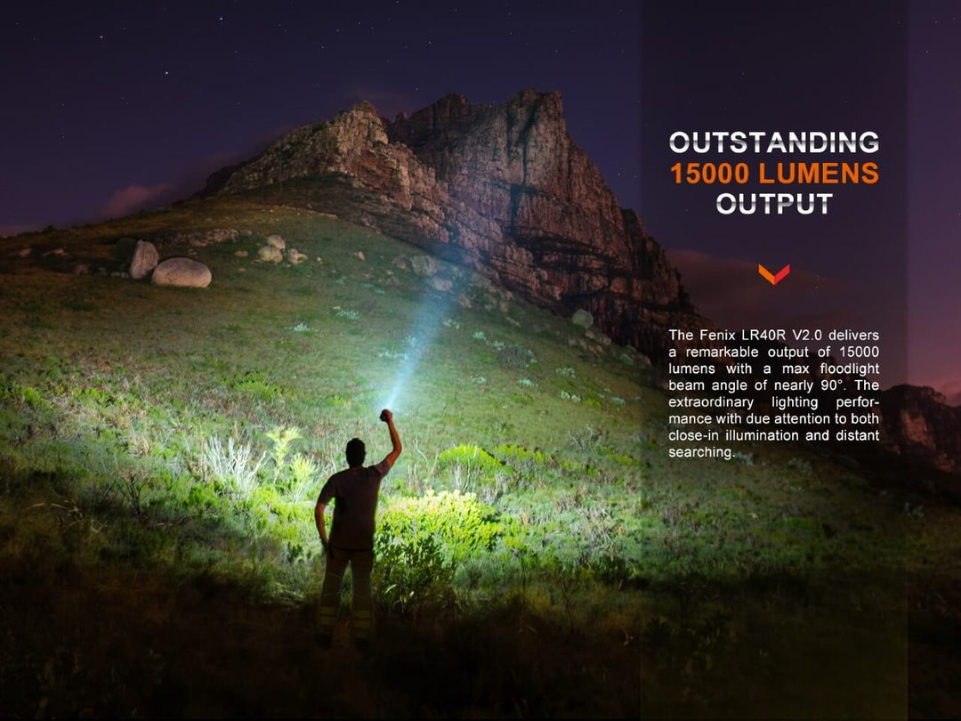 Fenix LR40R V2 rechargeable LED searchlight lighting up a mountain
