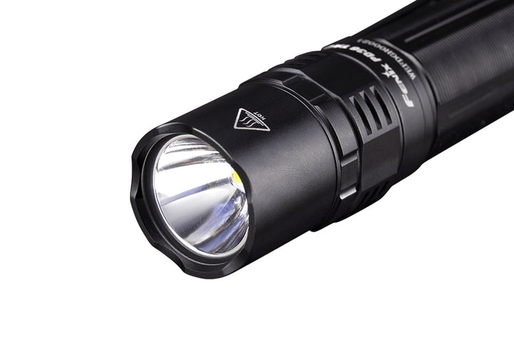 The lens of the Fenix PD36 TAC Tactical Flashlight 